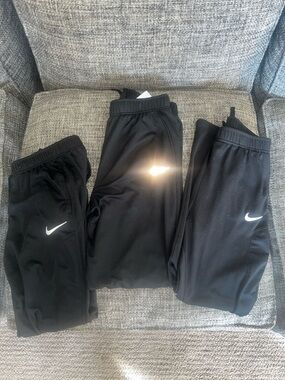 3 Nike Black Kids' Athletic Joggers with White Swoosh